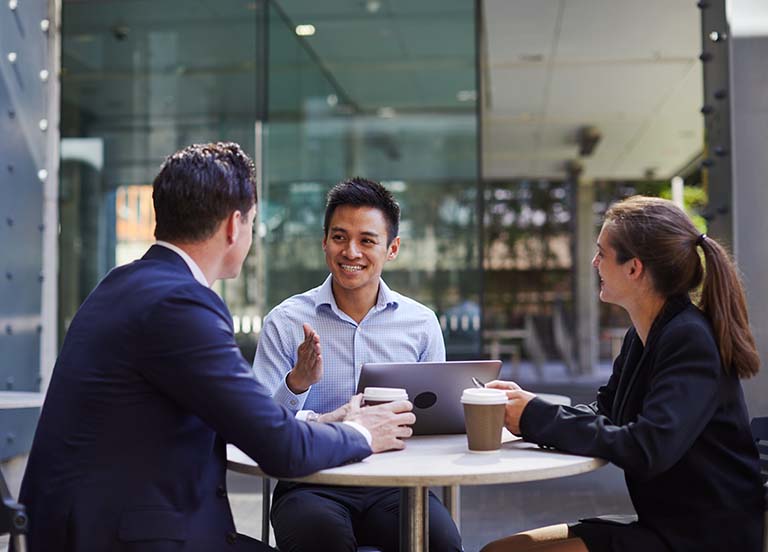 corporate business meeting outdoors on the move royalty free image