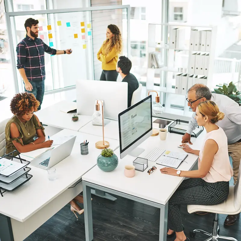 A group of businesspeople working in an office