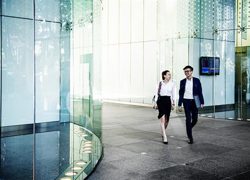 business people walking outside business people walking outside