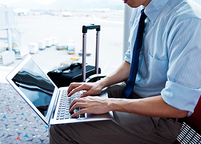 Business Traveler Using Keyboard